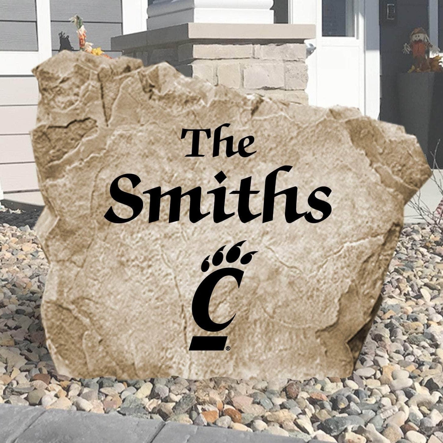 Personalized University of Cincinnati Name Stone engraved with your family surname, creating a bold Bearcats-inspired centerpiece for your home's landscape.