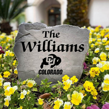 Officially licensed Colorado Buffaloes Name Stone handcrafted in the USA with custom family engraving and detailed team artwork. This decorative garden stone enhances landscape beds, patios, and outdoor living spaces with lasting beauty and school spirit.