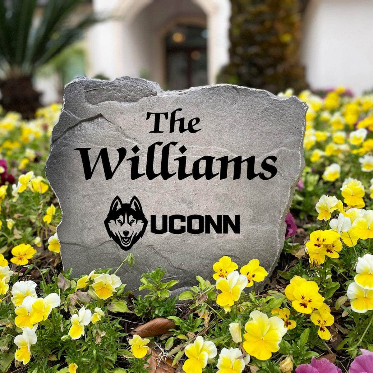Premium University of Connecticut family monument combining expert craftsmanship with personalized engraving to create a striking focal point for any residential landscape.
