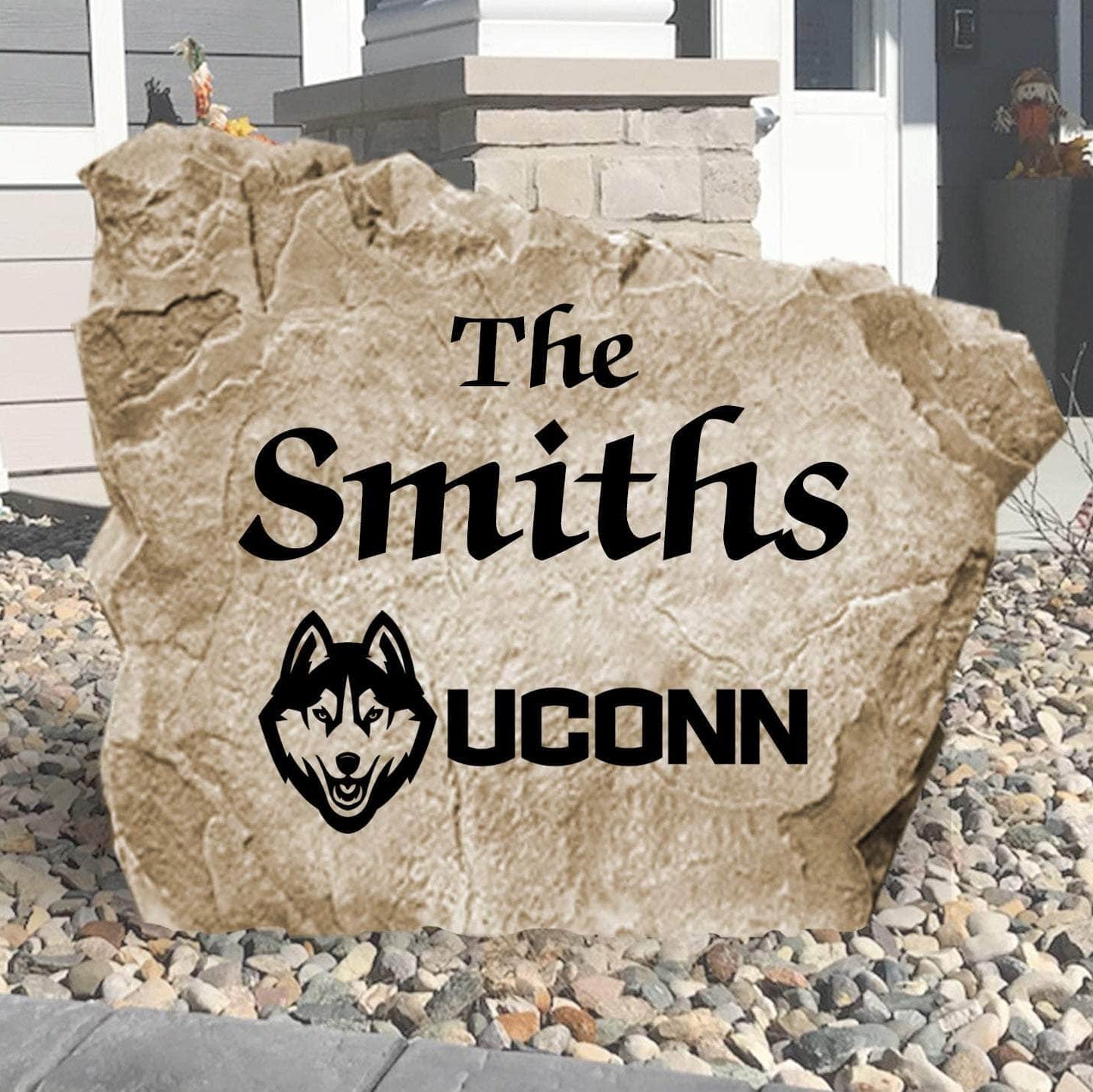 Personalized University of Connecticut Name Stone engraved with your family surname, creating a bold Huskies-inspired centerpiece for your home's landscape.