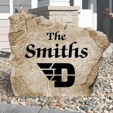 Personalized University of Dayton Name Stone engraved with your family surname, creating a distinguished Flyers-inspired centerpiece for your home's landscape.