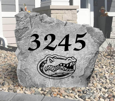 Custom University of Florida yard rock with personalized address engraving.