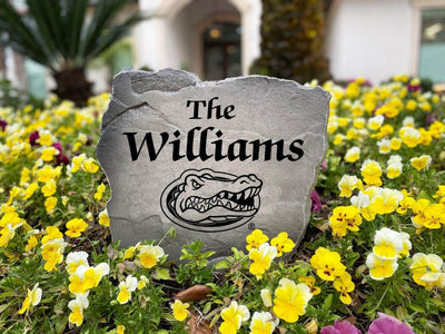University of Florida custom rock featuring engraved surname and Gators logo.
