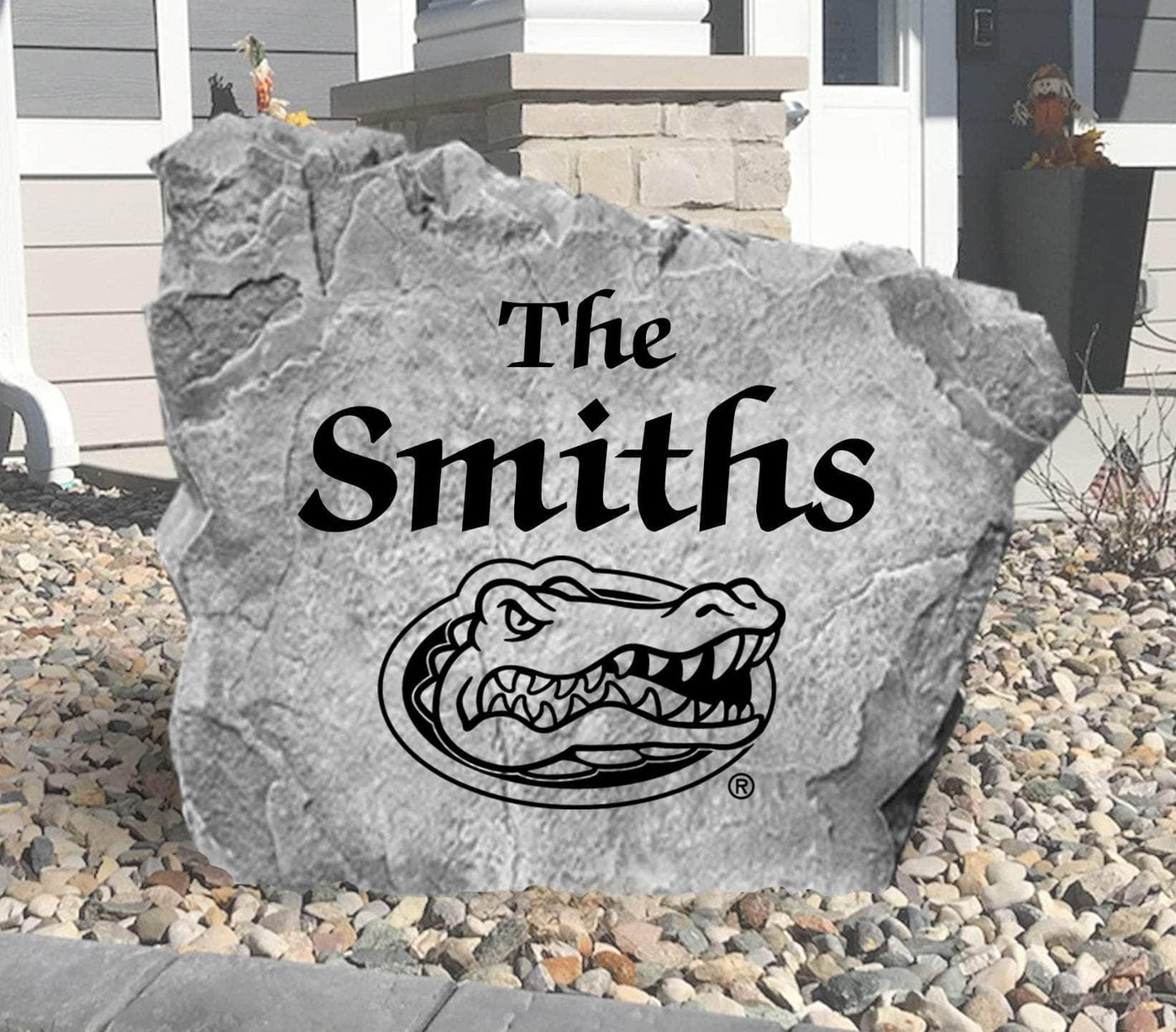 Personalized University of Florida yard rock featuring Gators logo and name.