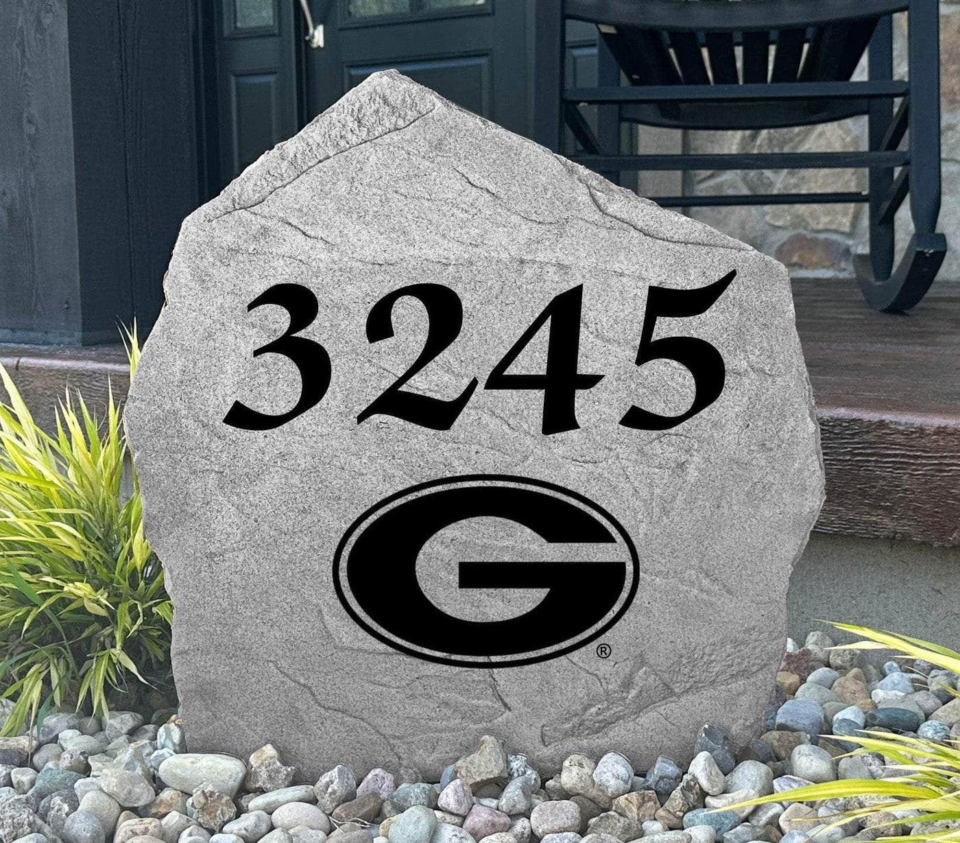 Engraved rock showing house number and UGA logo for front porch