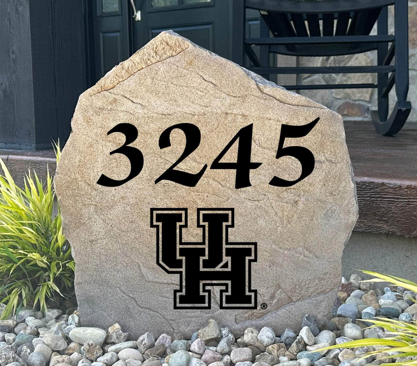 University of Houston address stone with engraved house number and official UH logo.