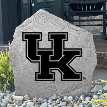 Custom Kentucky Wildcats Logo Stone displayed in a landscaped flower bed, showcasing officially licensed team artwork permanently engraved into the stone. This outdoor accent creates a beautiful focal point for alumni homes and devoted Wildcats fans.