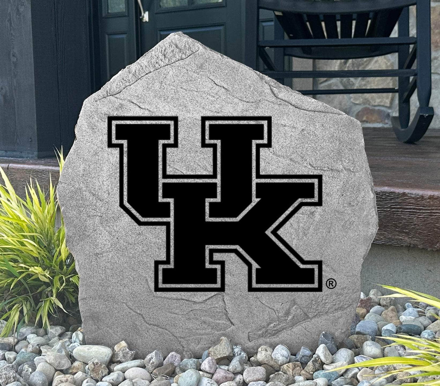 Engraved rock featuring UK logo for college fan landscaping