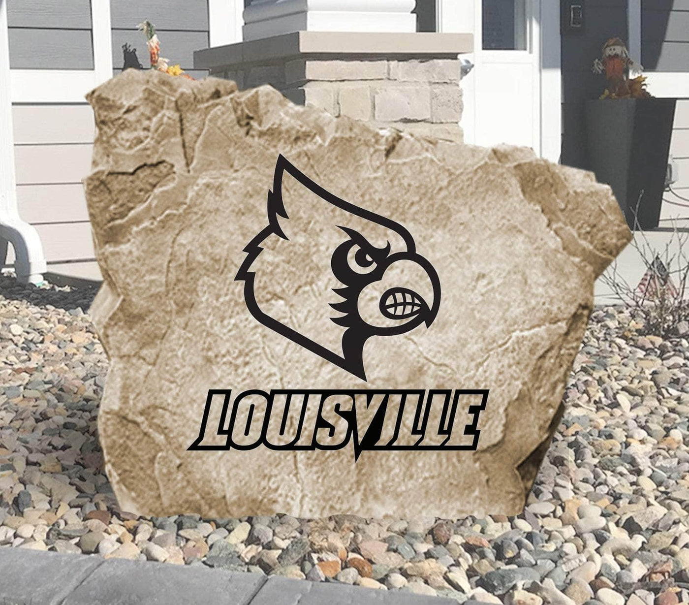 Outdoor engraved stone featuring University of Louisville Cardinals logo