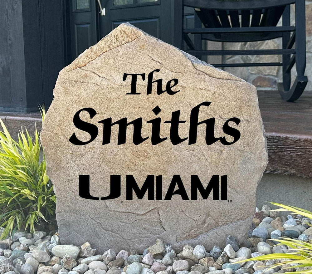 Officially licensed University of Miami Name Stone featuring a personalized family name and the iconic Miami Hurricanes logo engraved directly into the stone surface. This custom engraved garden stone adds school pride and curb appeal to front yards, patios, gardens, and entryways.