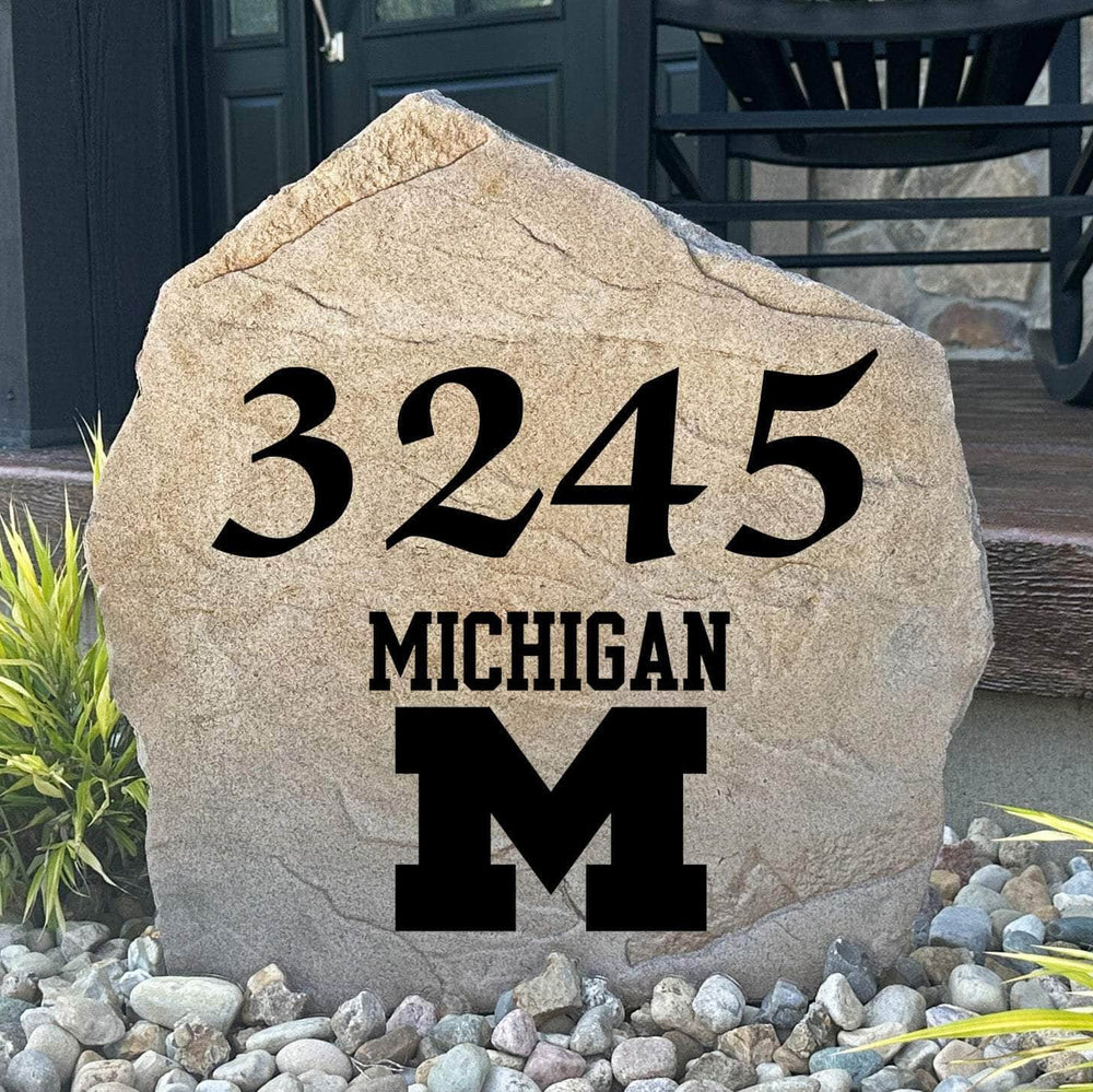 Officially licensed University of Michigan Address Stone featuring custom house numbers and the iconic Michigan Wolverines logo engraved directly into the stone surface. This personalized address marker adds school pride and curb appeal to front yards, gardens, driveways, and entryways.
