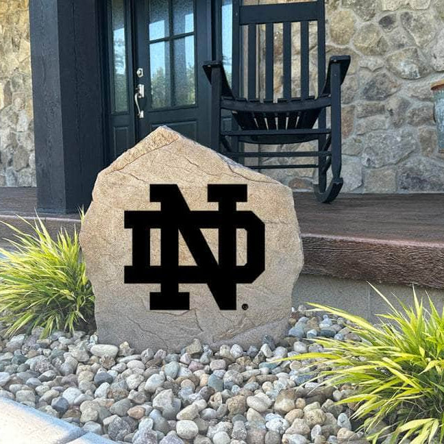 Decorative Notre Dame Fighting Irish Logo Stone with officially licensed team artwork permanently engraved into the stone surface. Perfect for gardens, patios, fan caves, and entryways, this outdoor accent celebrates Notre Dame tradition.
