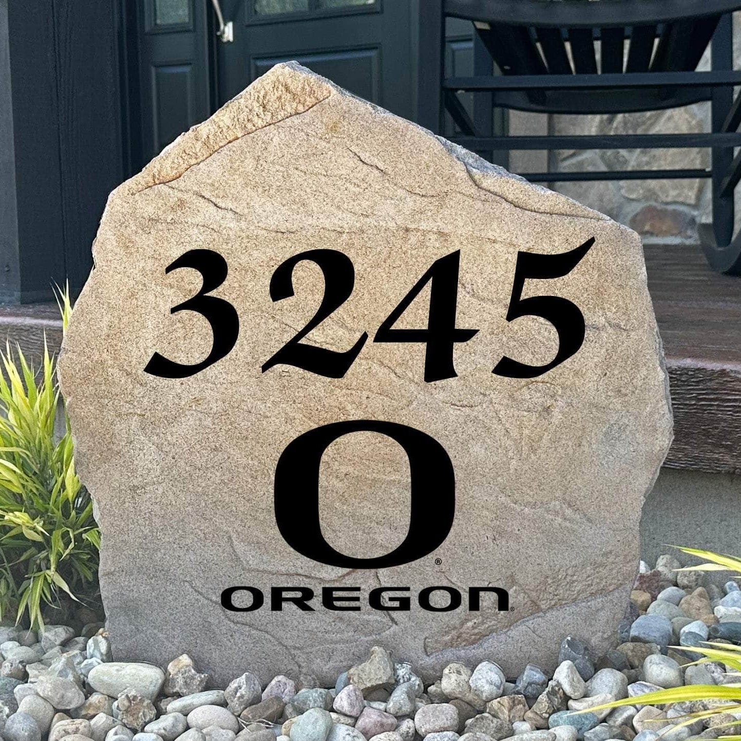 Officially licensed University of Oregon Address Stone featuring custom house numbers and the iconic Oregon Ducks logo engraved directly into the stone surface. This personalized address marker adds school pride and curb appeal to front yards, gardens, driveways, and entryways.