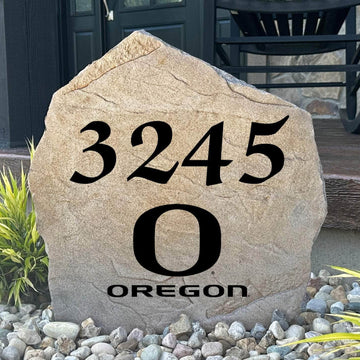 Officially licensed University of Oregon Address Stone featuring custom house numbers and the iconic Oregon Ducks logo engraved directly into the stone surface. This personalized address marker adds school pride and curb appeal to front yards, gardens, driveways, and entryways.