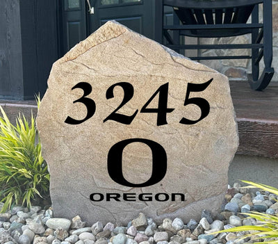 University of Oregon address stone with engraved house number and Ducks “O” logo.