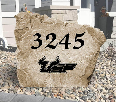 Engraved University of South Florida Bulls logo with house number on landscaping stone