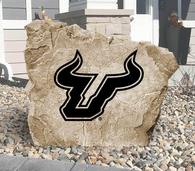 Engraved University of South Florida Bulls logo on decorative landscaping stone