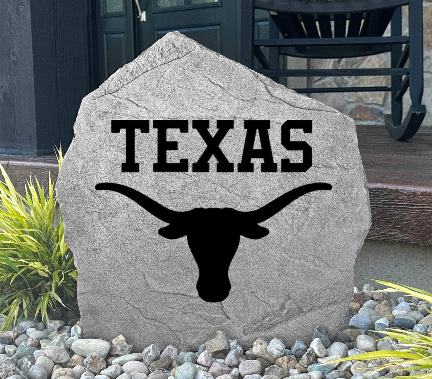 Engraved stone featuring University of Texas emblem