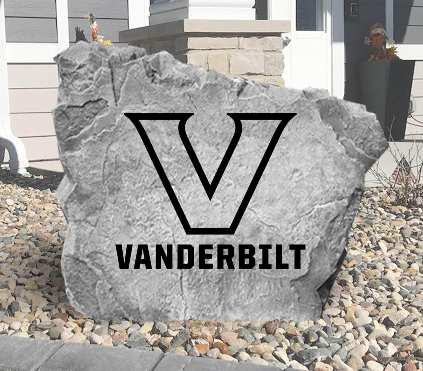Engraved concrete stone featuring Vanderbilt University emblem