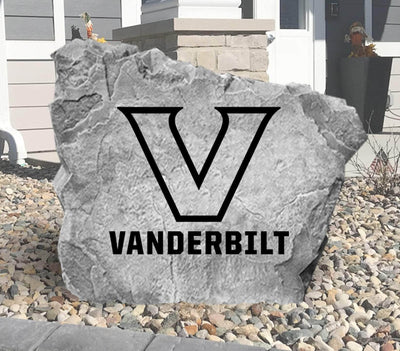 Engraved concrete stone featuring Vanderbilt University emblem