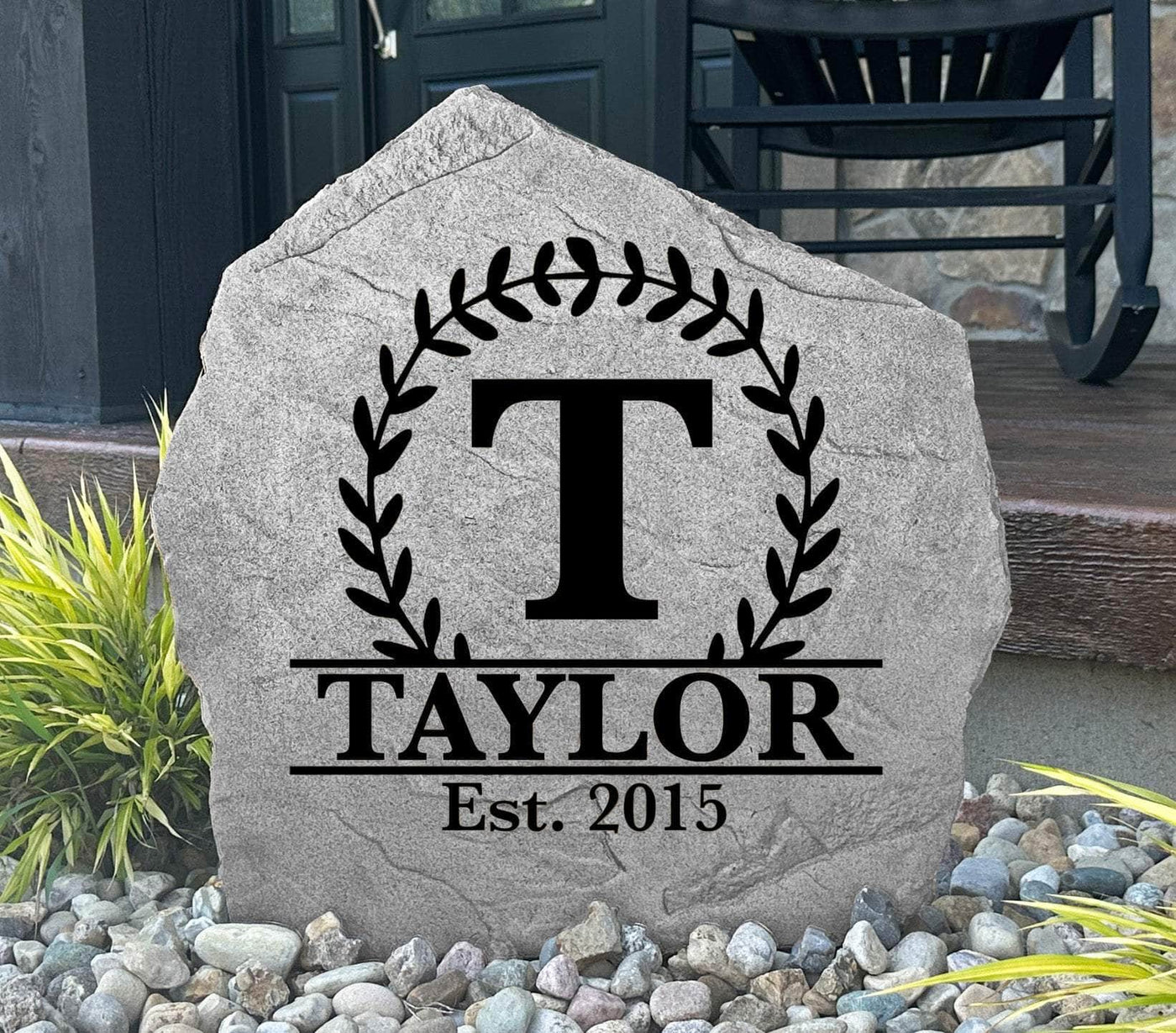 Vine monogram stone engraved with family initial and established date for landscaping décor