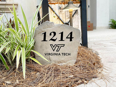 Decorative stone with engraved Virginia Tech Hokies emblem and address
