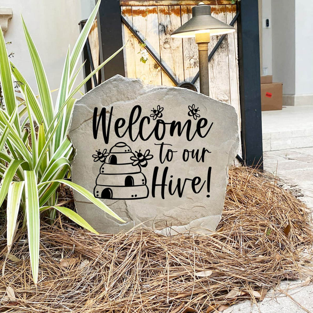 Decorative Welcome Hive Stone with elegant bee and honeycomb details permanently engraved into the stone. Ideal for garden lovers, this outdoor accent enhances front yards, patios, and flower beds with timeless style.