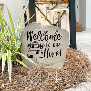 Decorative Welcome Hive Stone with elegant bee and honeycomb details permanently engraved into the stone. Ideal for garden lovers, this outdoor accent enhances front yards, patios, and flower beds with timeless style.