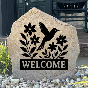 Personalized Welcome Hummingbird Stone featuring a graceful hummingbird design engraved directly into the stone surface. This decorative garden stone adds charm and curb appeal to front yards, flower beds, patios, and entryways.