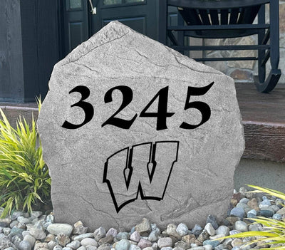 Engraved rock with Wisconsin Badgers branding, perfect for front yard display.