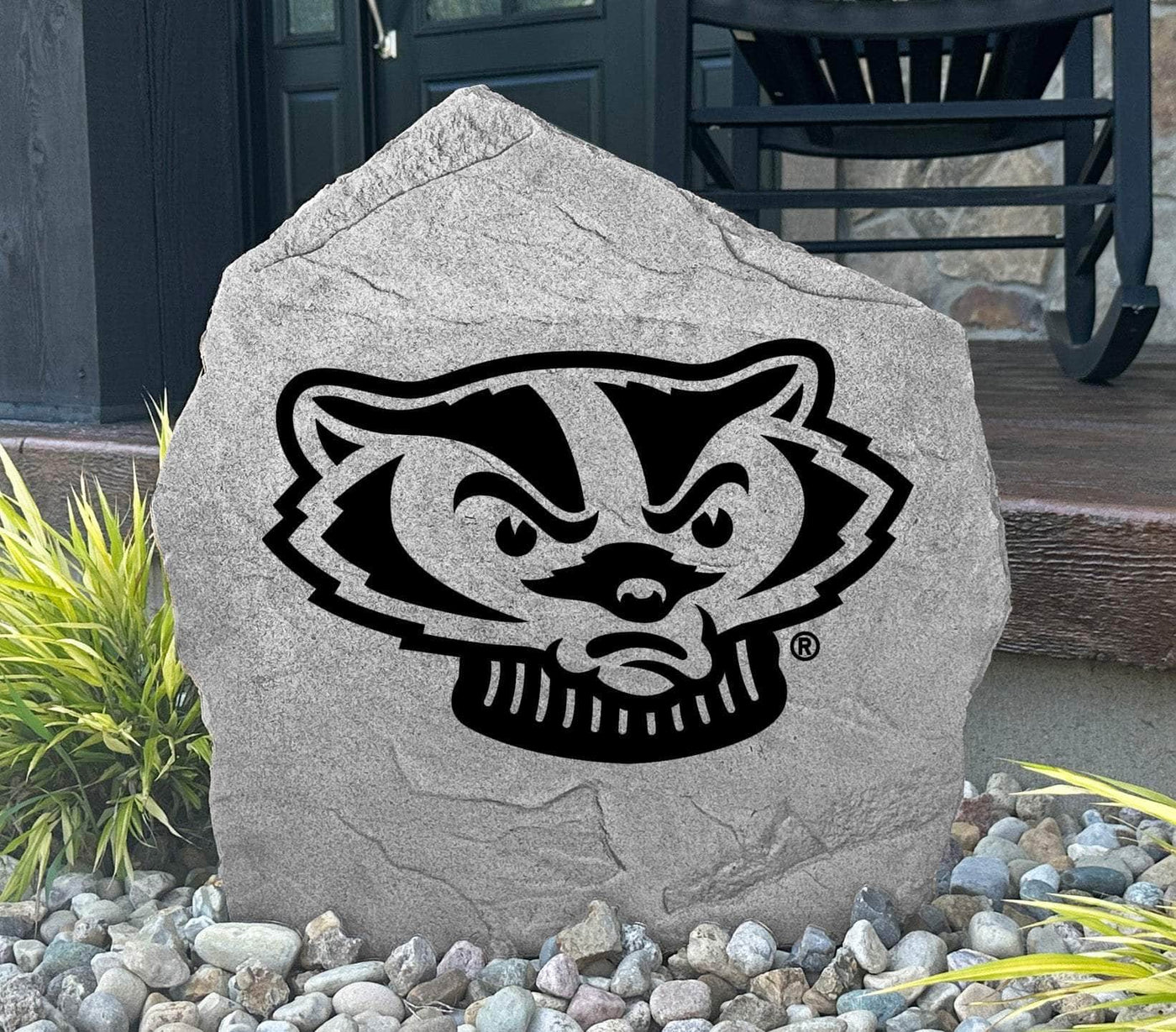 Bold outdoor rock with Wisconsin Badgers Bucky logo, ideal for landscaping.