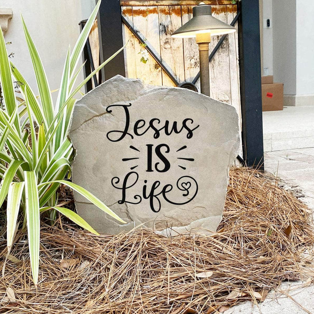 expression of hope and devotion for your home.
Faith-based outdoor stone featuring the message "Jesus Is Life," designed to bring encouragement and spiritual beauty to flower beds, patios, and entryways.