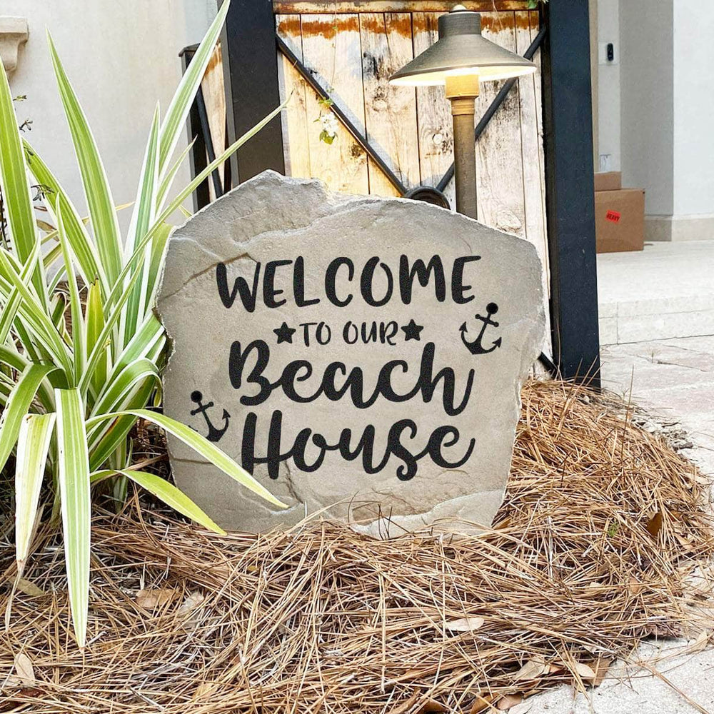 Coastal landscape stone featuring the phrase "Welcome To Our Beach House," perfect for entryways, garden beds, walkways, and outdoor entertaining areas.