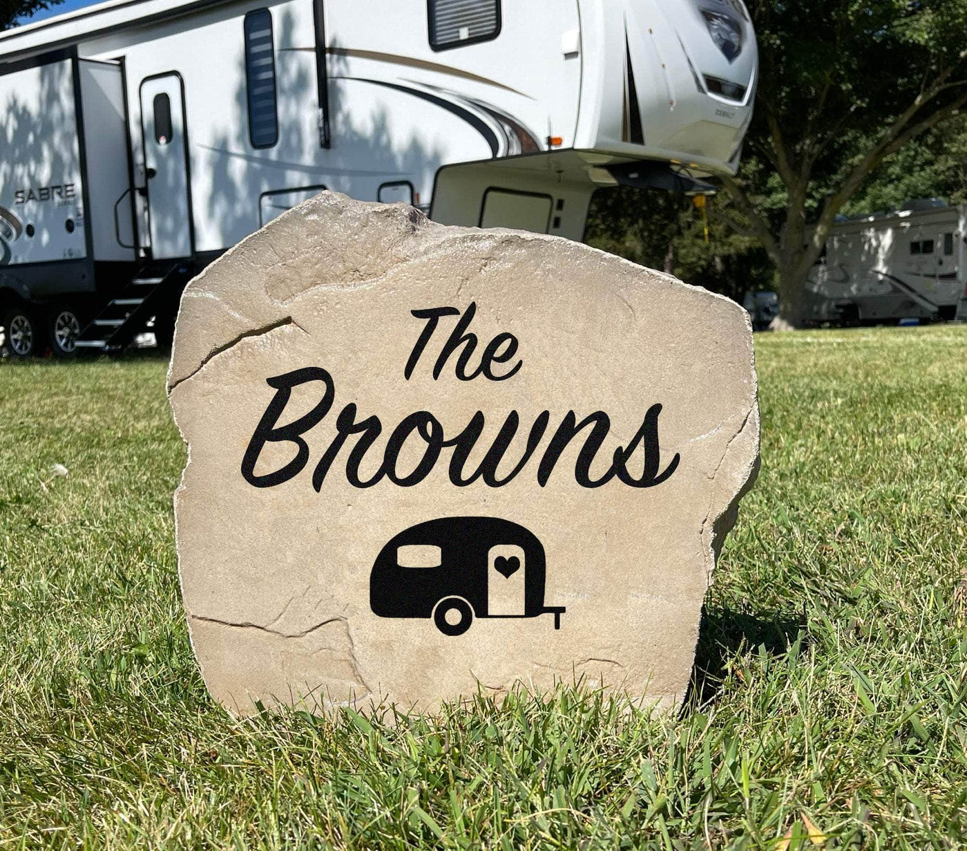 Rustic engraved rock with camper design for outdoor yard decor
