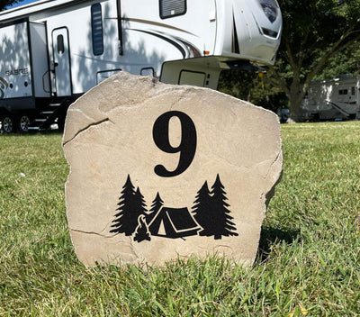 Custom RV site rock address stone for campers and outdoor enthusiasts.