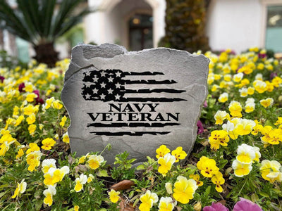 Patriotic memorial stone honoring veterans with flag design
