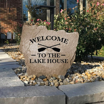 Lake house landscape stone featuring the message "Welcome To The Lake House," perfect for creating an inviting entrance to your favorite getaway.