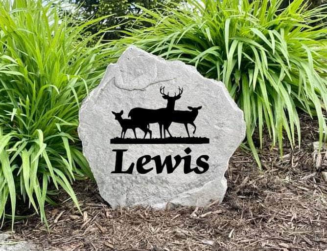 Family name deer stone engraved for rustic landscaping design