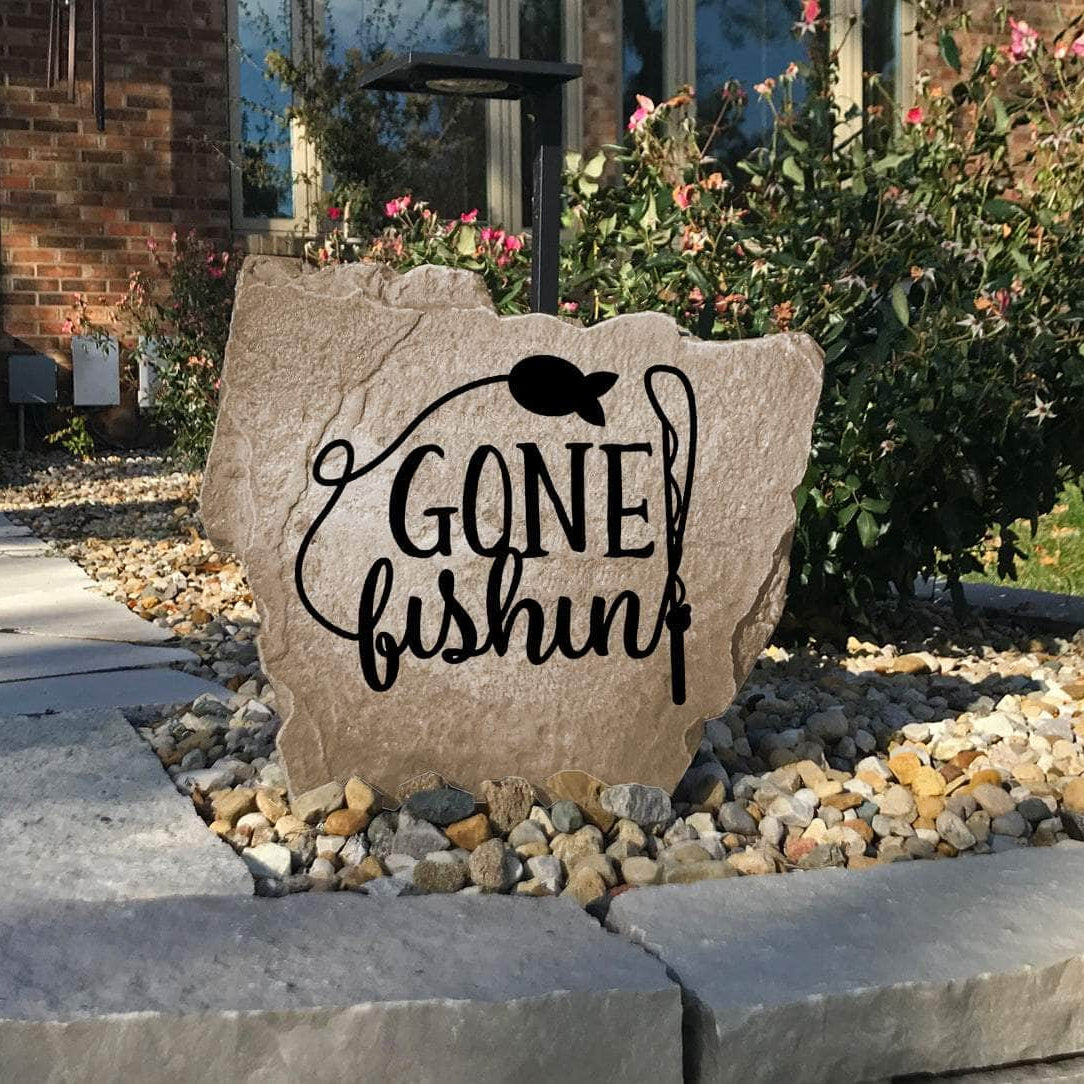 Weather-resistant Gone Fishin' outdoor monument designed to celebrate the love of fishing while enhancing walkways, patios, and lakeside décor.