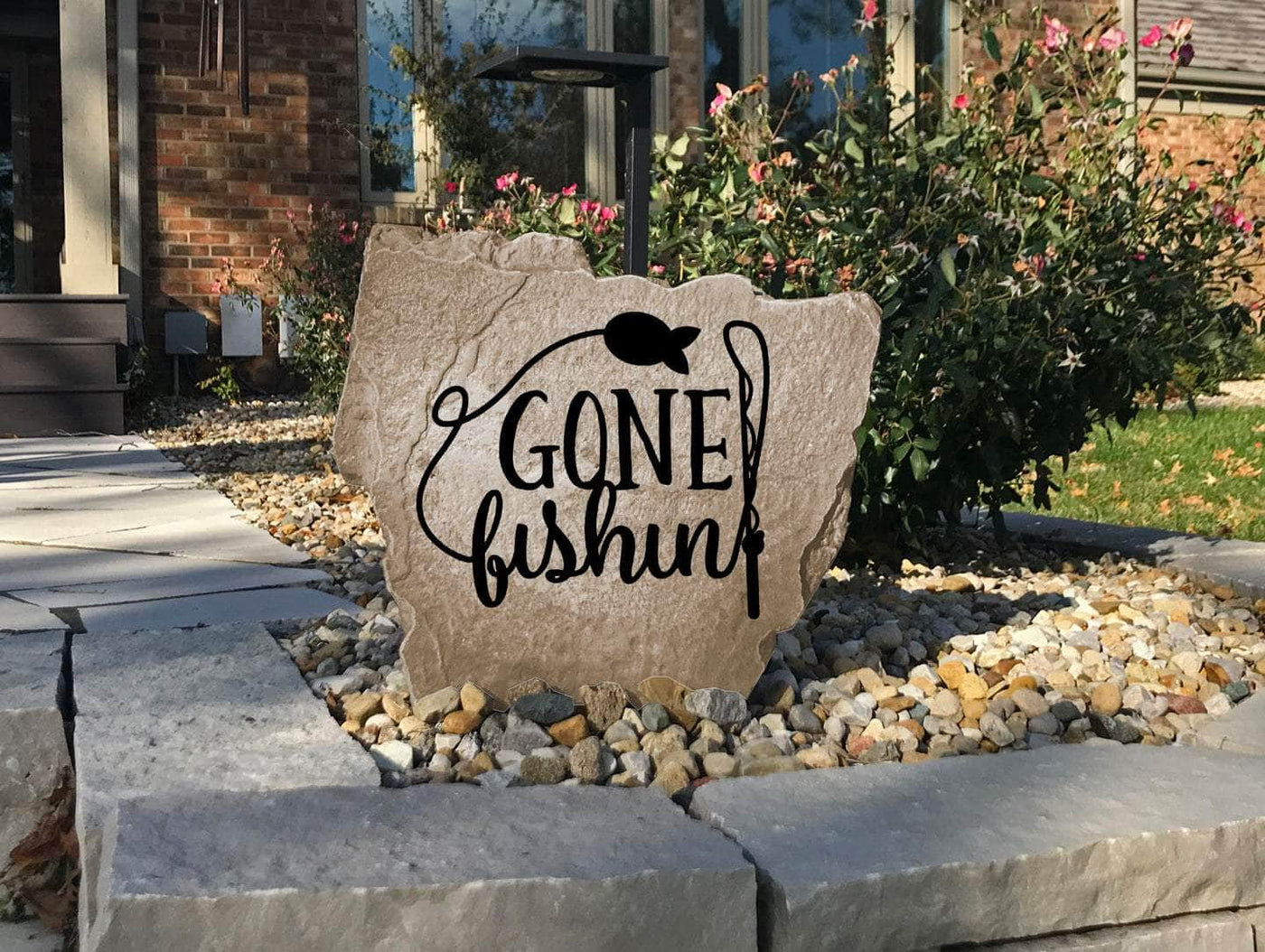 Durable outdoor Gone Fishin’ stone, perfect for fishing lodge or retreat