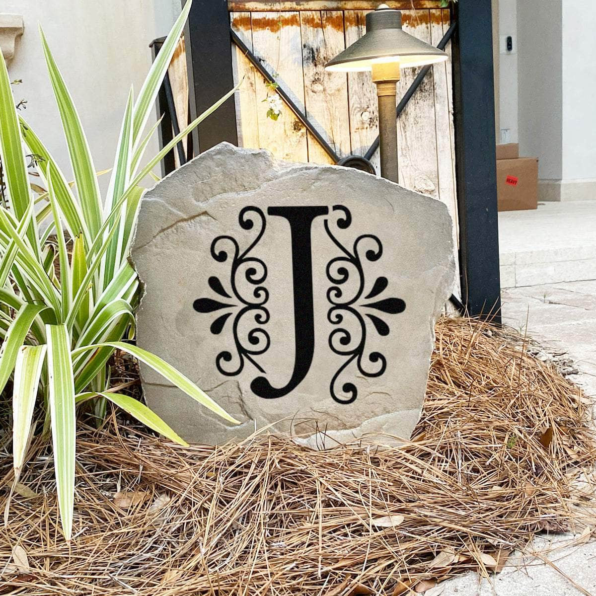 Weather-resistant personalized initial marker designed to complement residential landscapes with lasting beauty and premium outdoor craftsmanship.