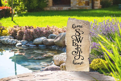 Vertical decorative rock engraved with Home Sweet Home message