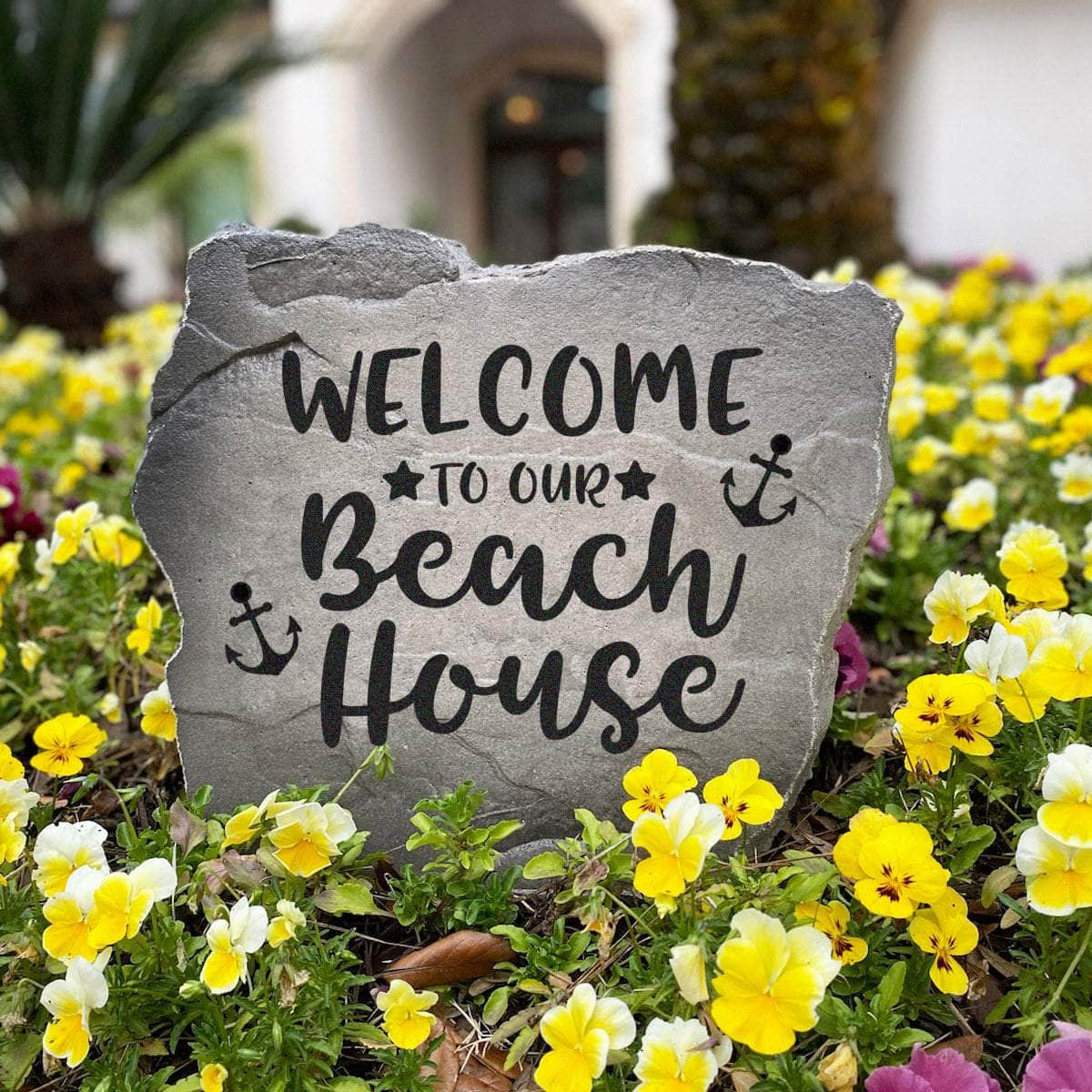 Weather-resistant beach house garden stone designed to complement tropical décor while adding timeless personality to your home's exterior.
