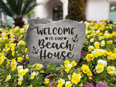 Engraved seaside stone with beach house welcome message