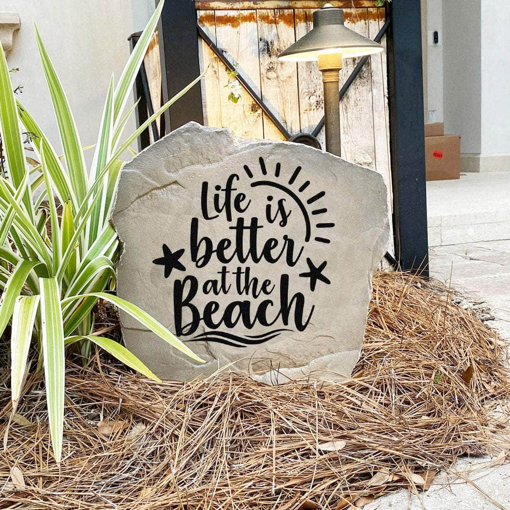 Coastal landscape stone crafted from durable concrete, celebrating the beach lifestyle with a timeless outdoor accent for gardens and walkways.