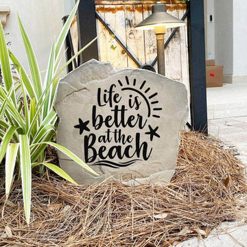 Coastal landscape stone crafted from durable concrete, celebrating the beach lifestyle with a timeless outdoor accent for gardens and walkways.