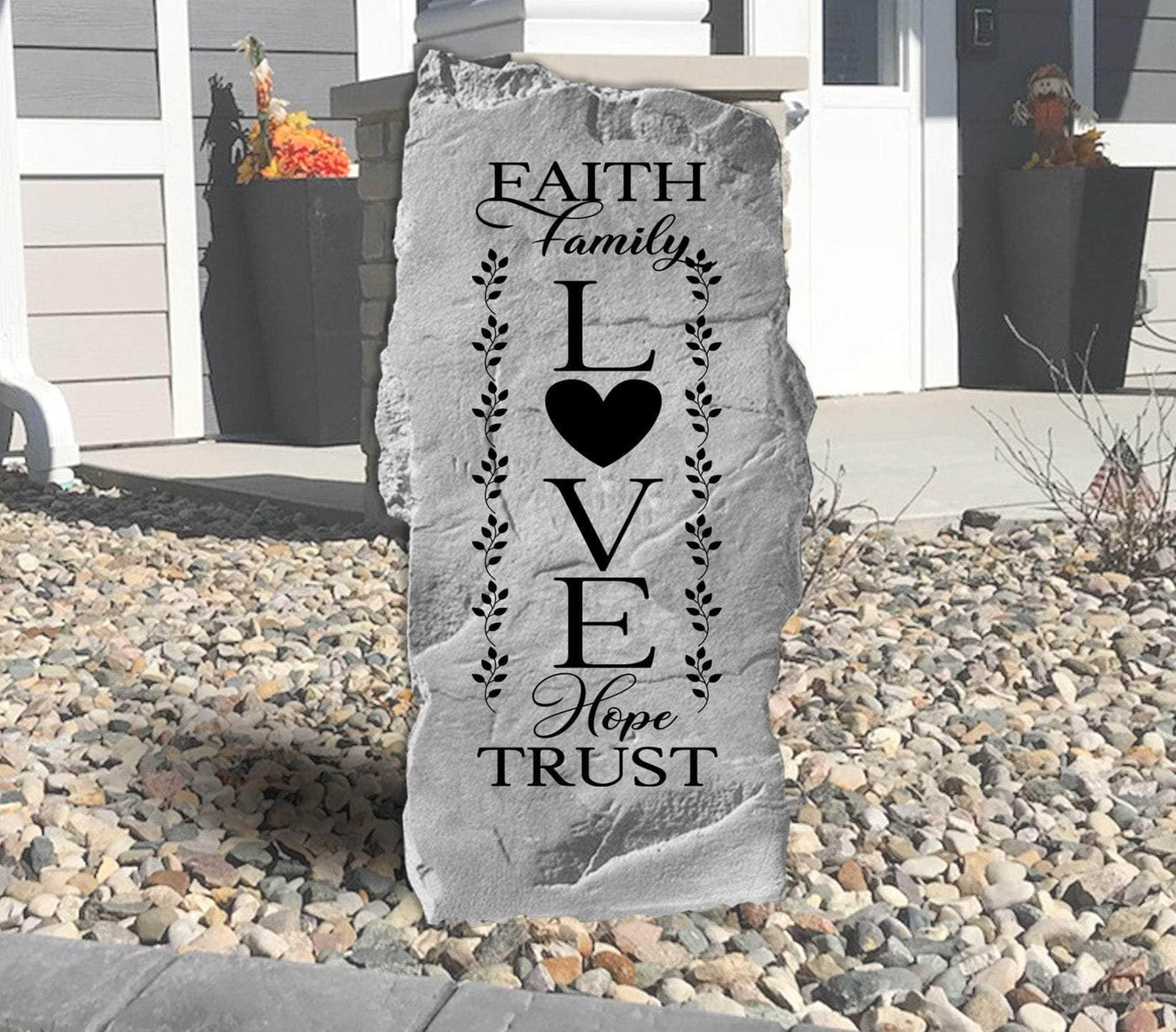 Decorative garden stone with Faith Family Love design