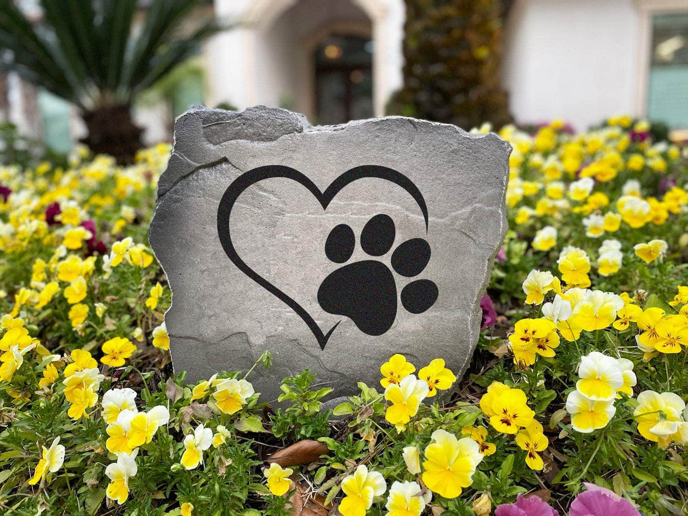 Engraved heart and paw print stone perfect for outdoor tribute