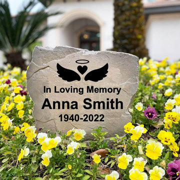 Inspirational memorial garden stone featuring graceful angel wings, offering a heartfelt place for reflection, remembrance, and healing.