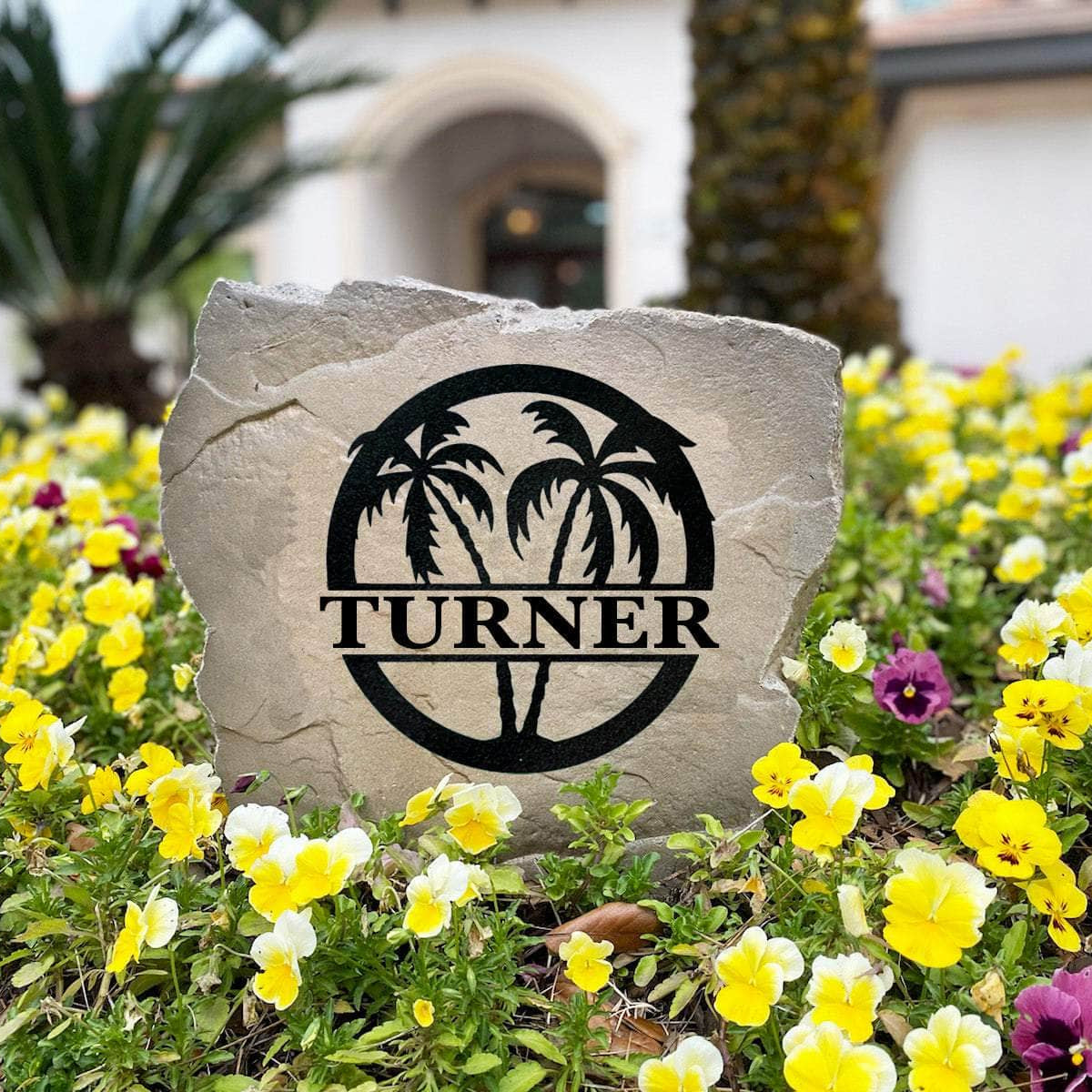Weather-resistant palm tree family name stone designed to enhance curb appeal with a custom monogram and timeless island-inspired style.